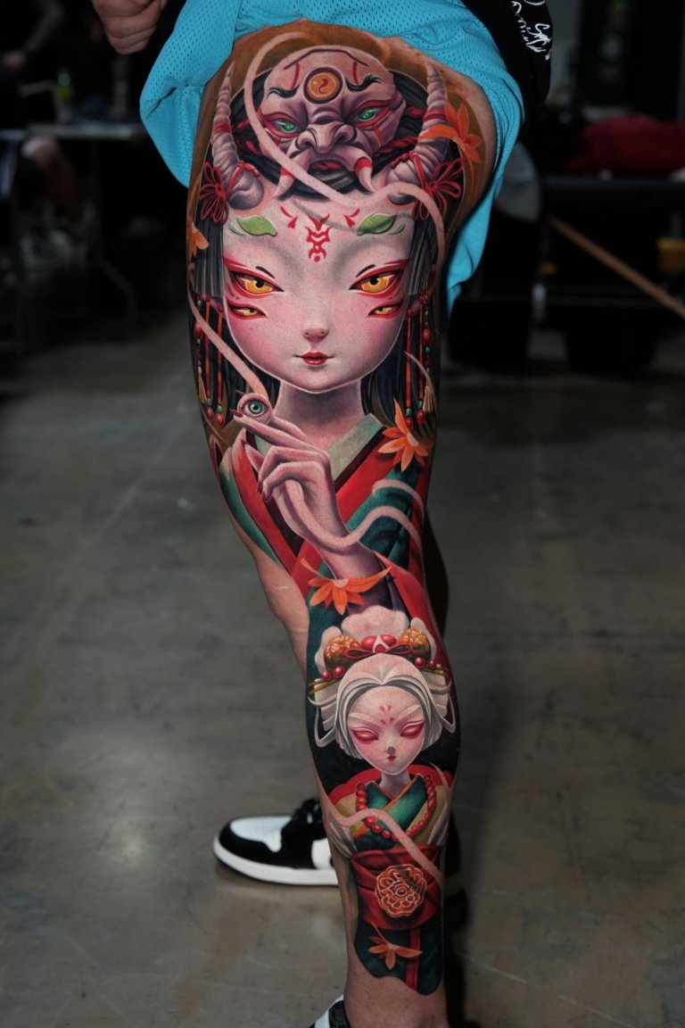 full leg evil doll tattoo style