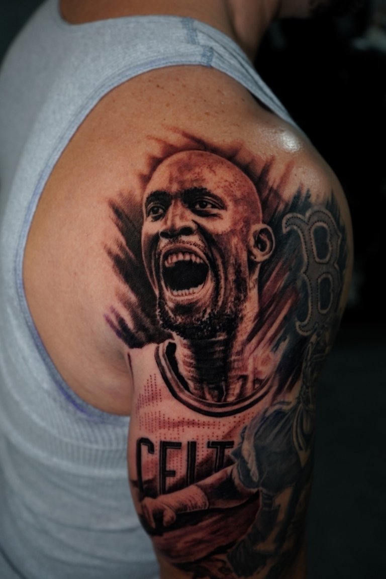 portrait tattoo on arm