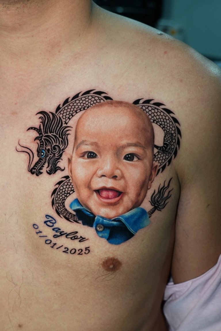 portrait tattoo on right chest