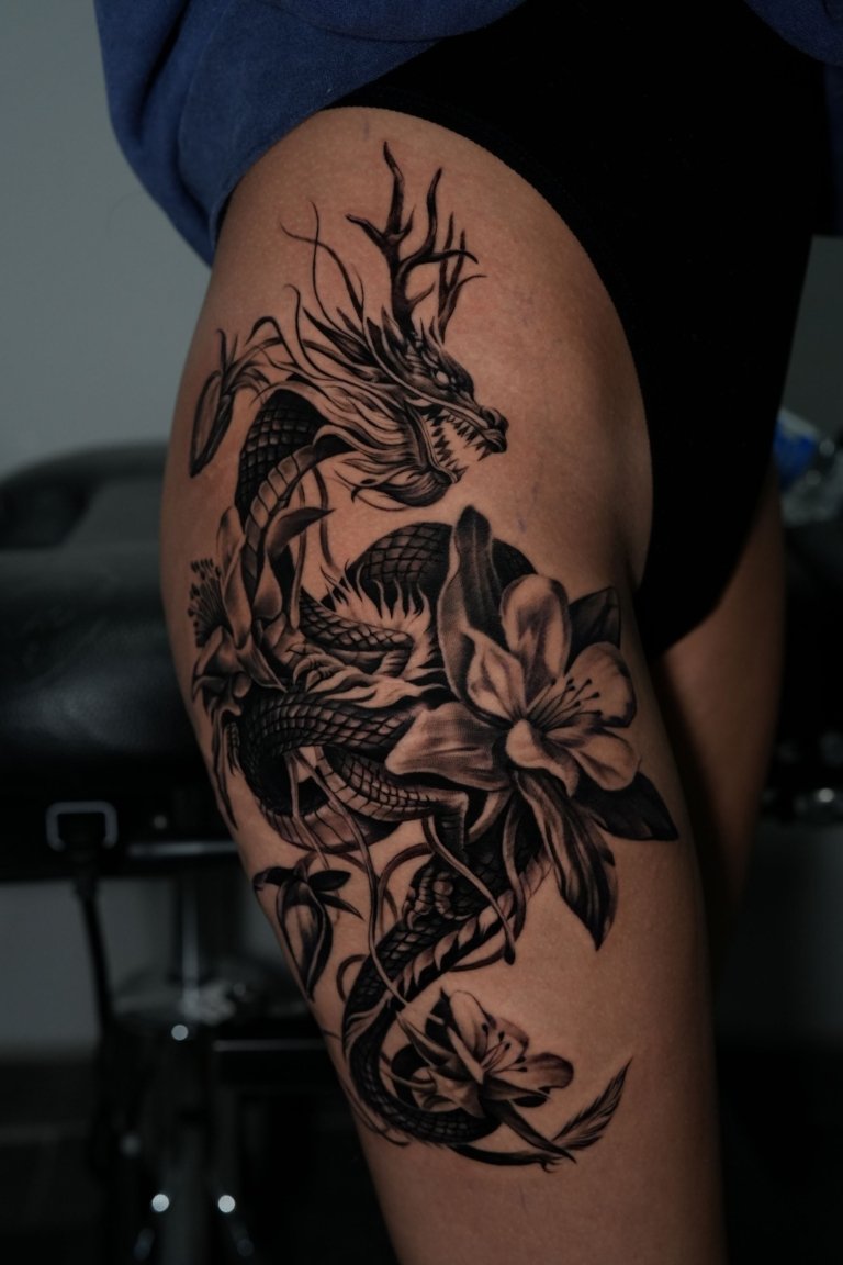 thigh black and gray tattoo