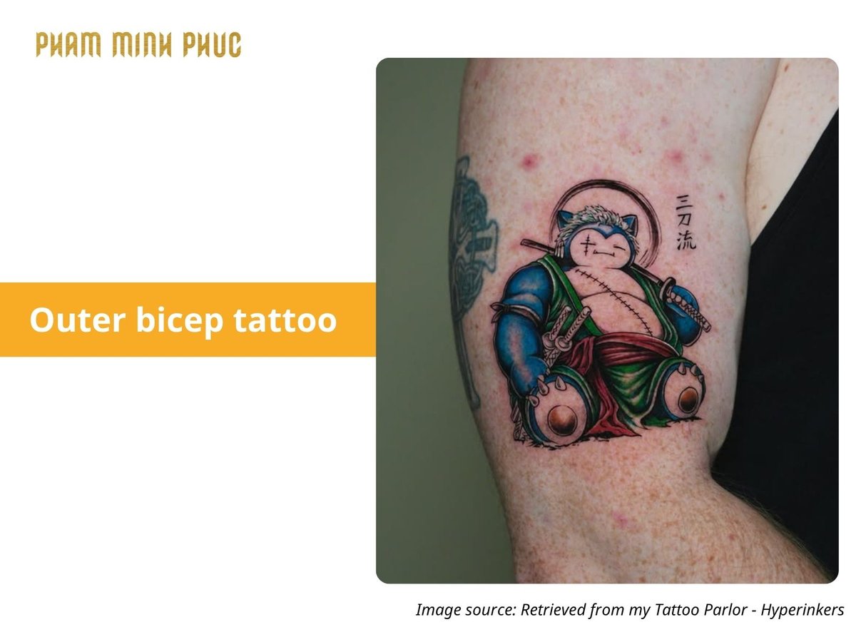 anime outer bicep tattoo