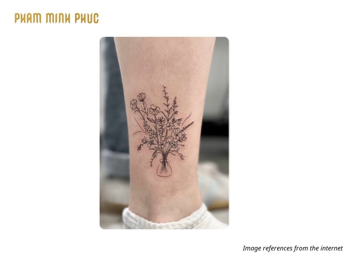 flower outer ankle tattoo idea