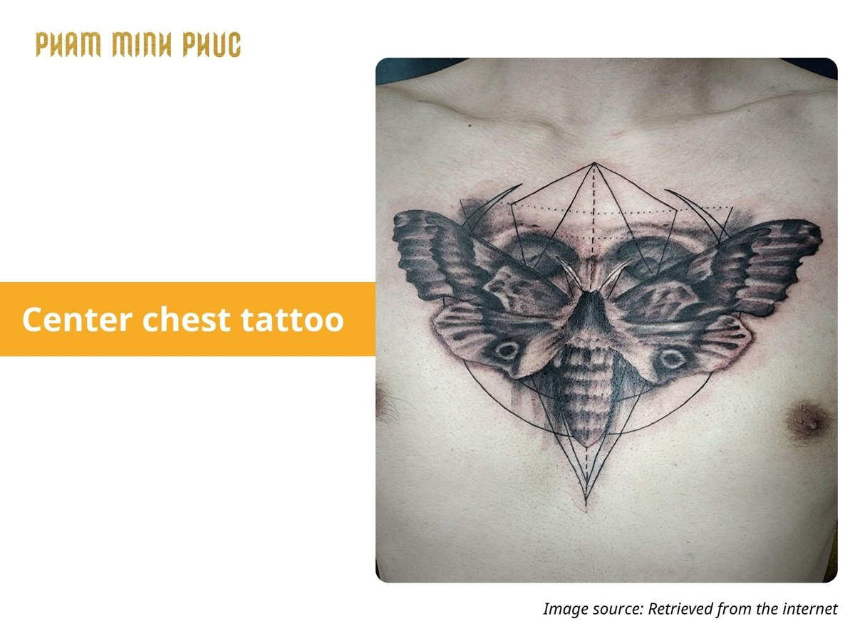 black and grey center chest tattoo