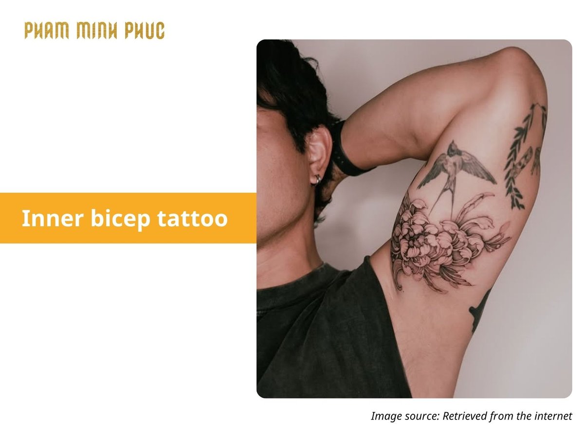 floral inner bicep tattoo