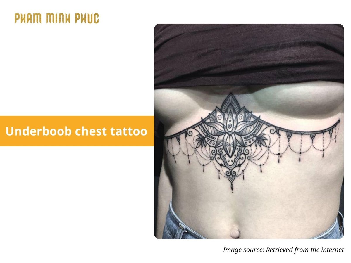 geometric underboob chest tattoo
