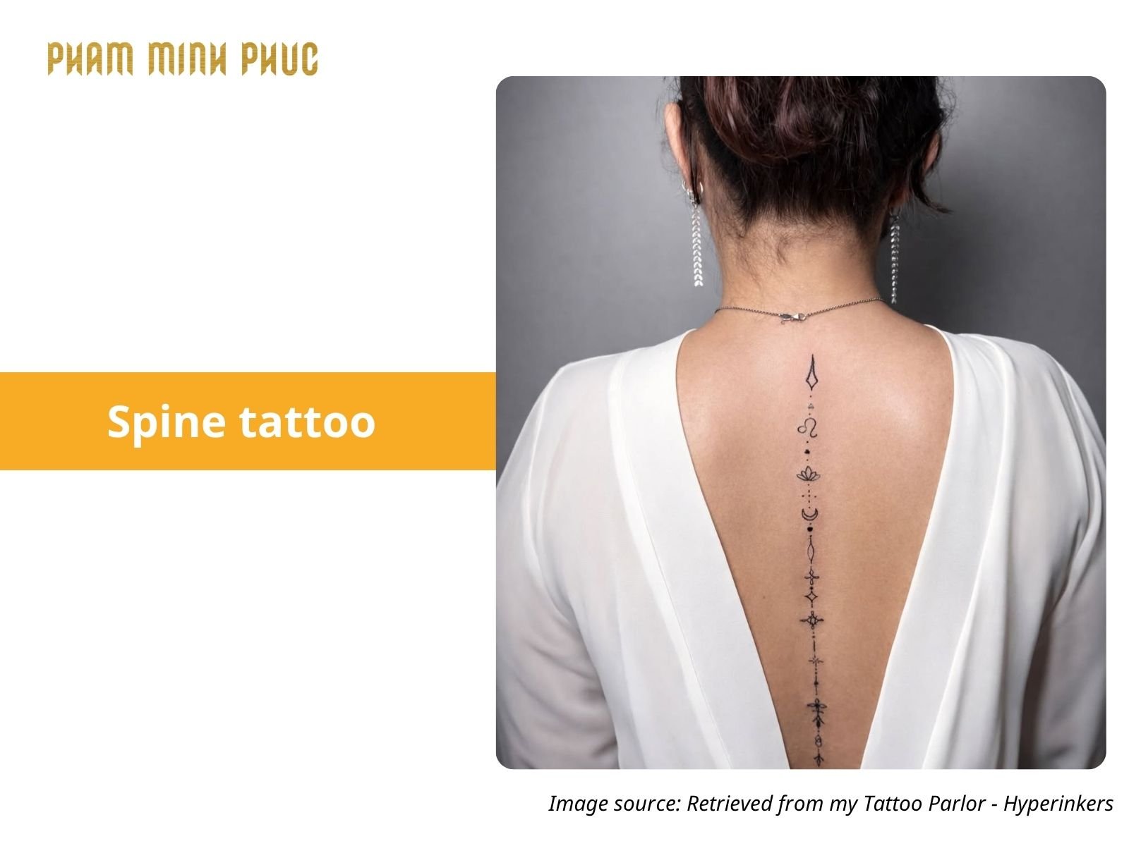mini symbol spine tattoo
