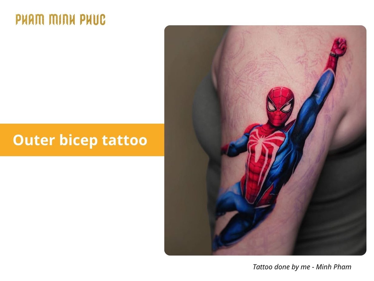 spiderman color outer bicep tattoo