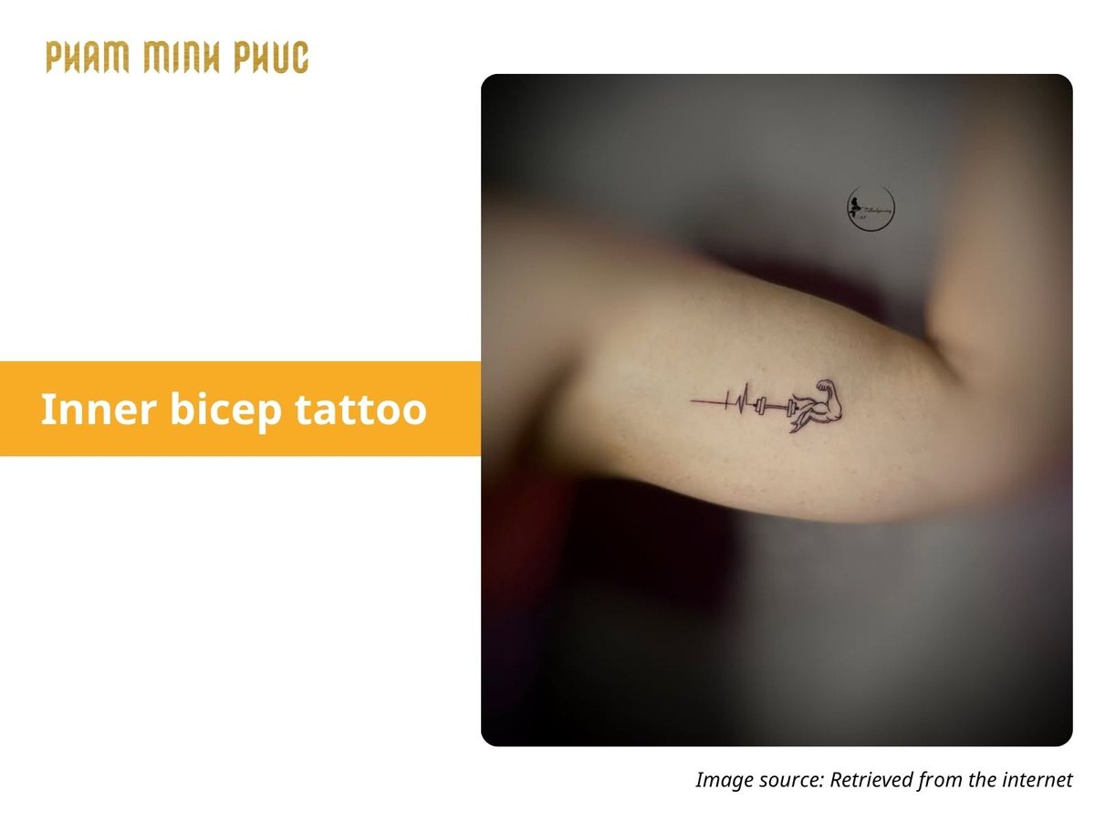 symbol inner bicep tattoo