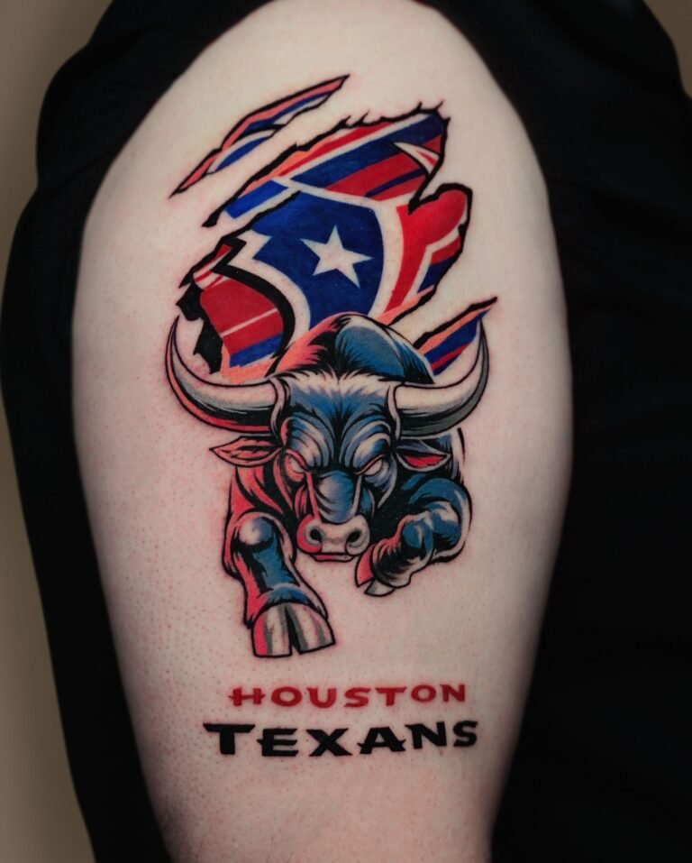 Color Houston Texans tattoo of a charging bull bursting through the ripped logo on the upper arm