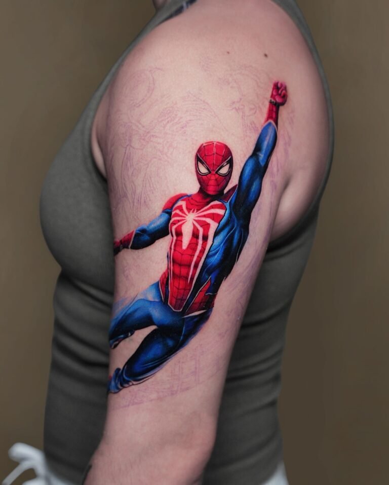 Color Spider-Man tattoo mid-swing on the upper arm as the start of a full sleeve